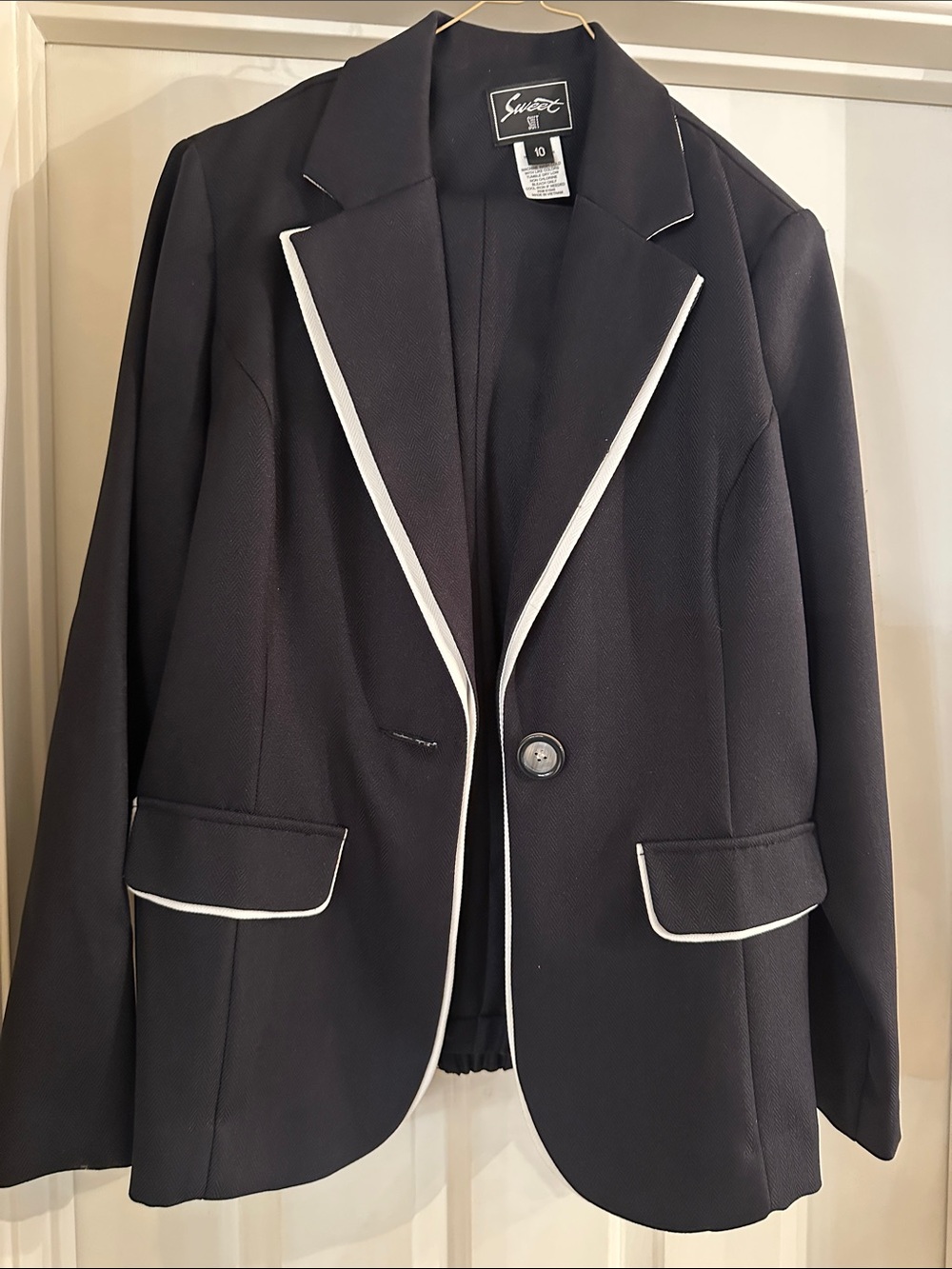 Woman black suit with White Trim